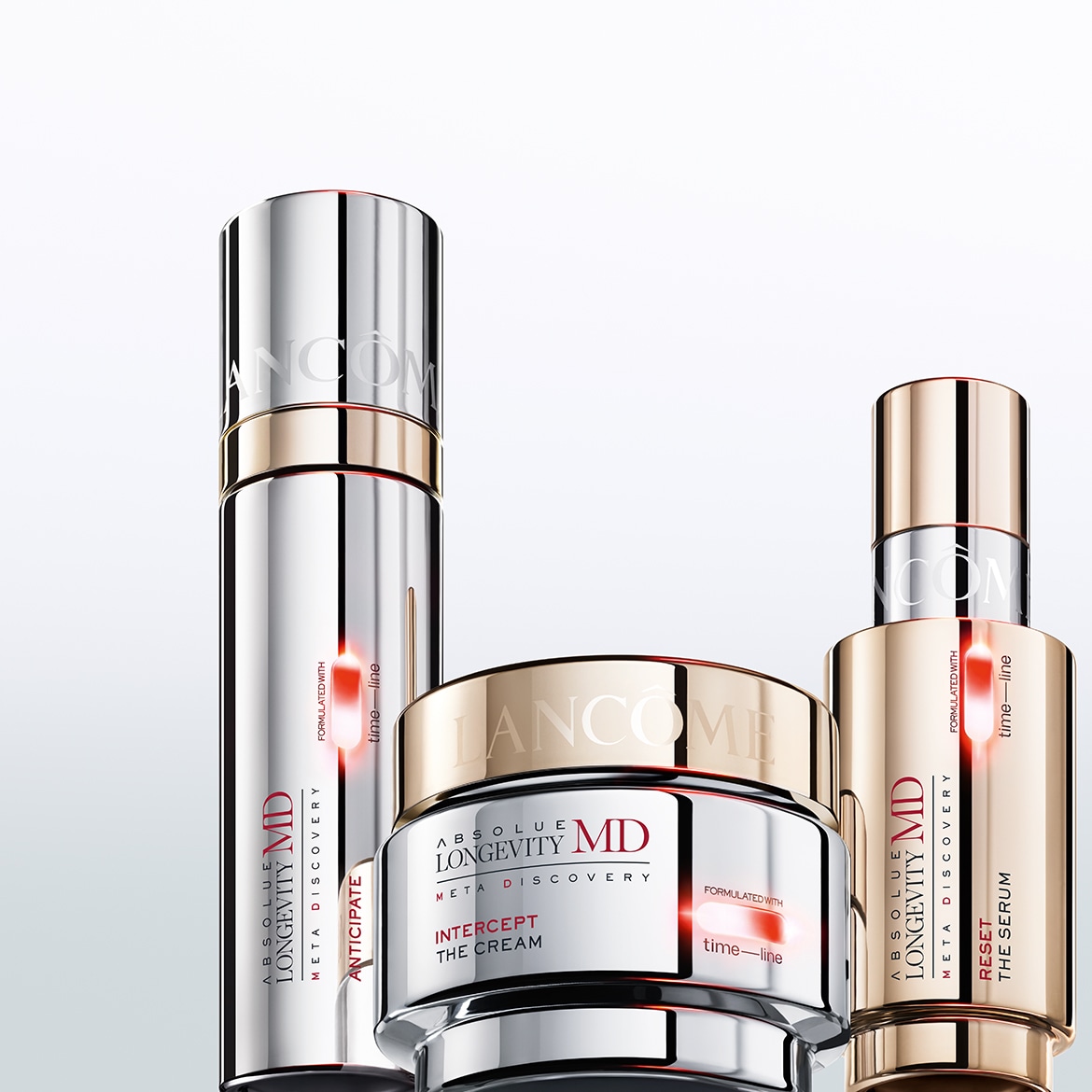 Découvrez la gamme Absolue Longevity MD de Lancôme, comprenant une crème, un sérum et un soin, présentés dans des emballages argentés et dorés élégants.