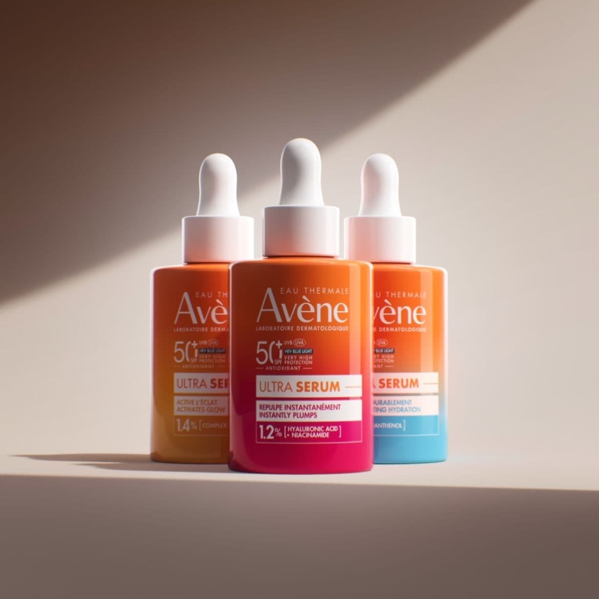 Découvrez les sérums Avène Eau Thermale, présentés dans des flacons colorés avec des pipettes blanches, offrant une protection solaire et des bienfaits antioxydants pour une peau éclatante et hydratée.