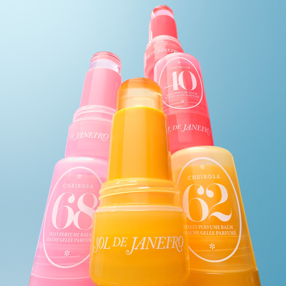 Découvrez les baumes parfumés en gelée Sol de Janeiro Cheirosa, présentés dans des emballages colorés rose, corail et jaune.