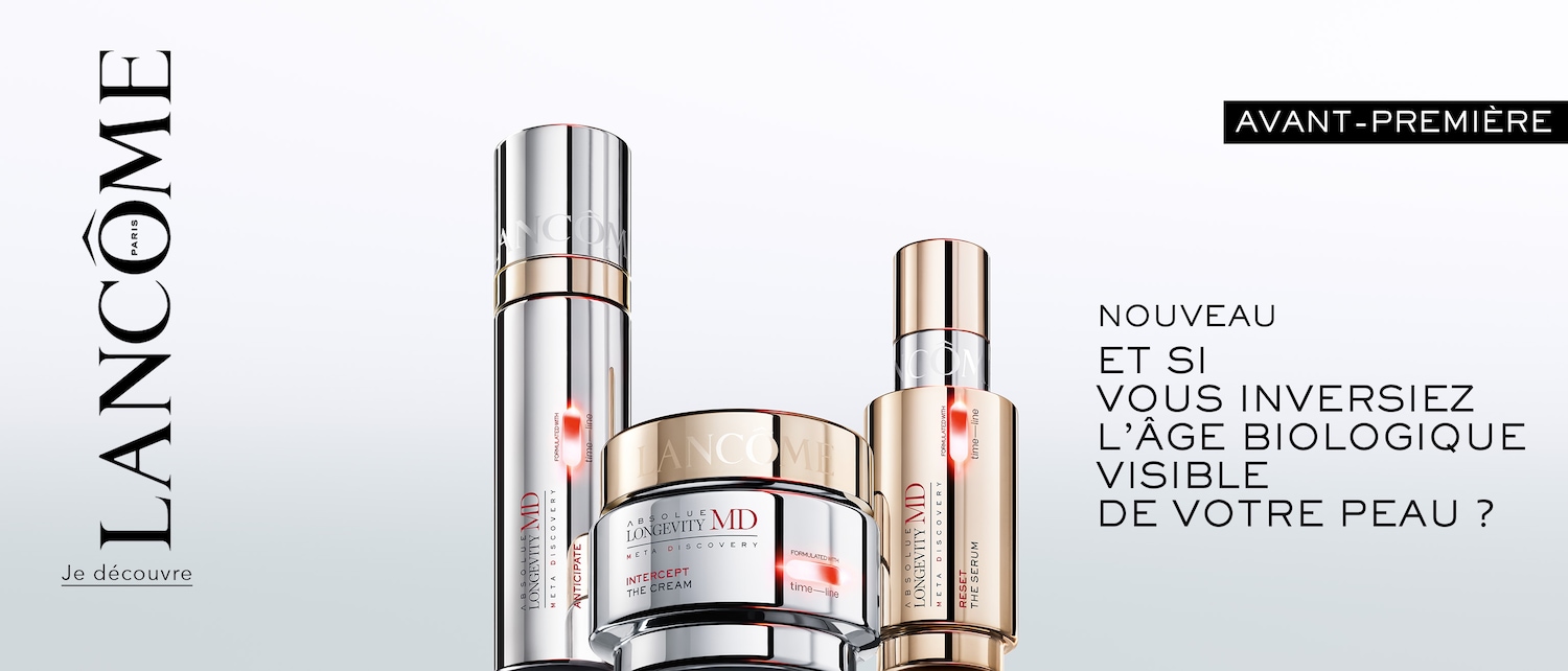 Découvrez la gamme Absolue Longevity MD de Lancôme, présentée dans des emballages argentés et dorés, conçue pour inverser l'âge biologique visible de votre peau.