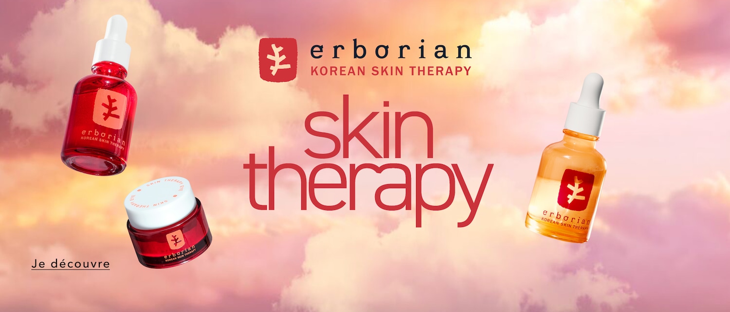 Découvrez la thérapie coréenne pour la peau d'Erborian, avec des sérums et des crèmes dans des emballages rouge et orange, conçus pour revitaliser et embellir votre peau.