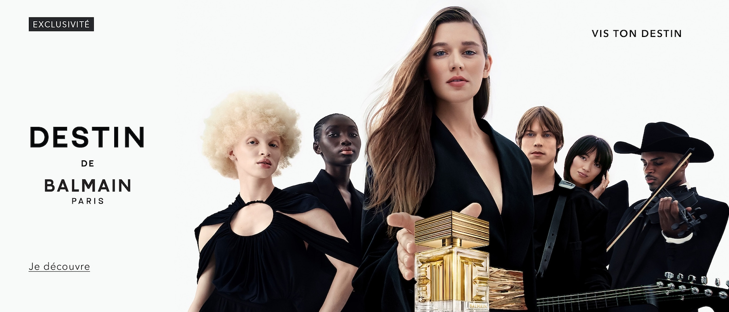 Découvrez Destin de Balmain Paris, un parfum exclusif présenté dans un flacon doré unique, entouré d'une campagne visuelle captivante avec divers modèles et musiciens. Je découvre.
