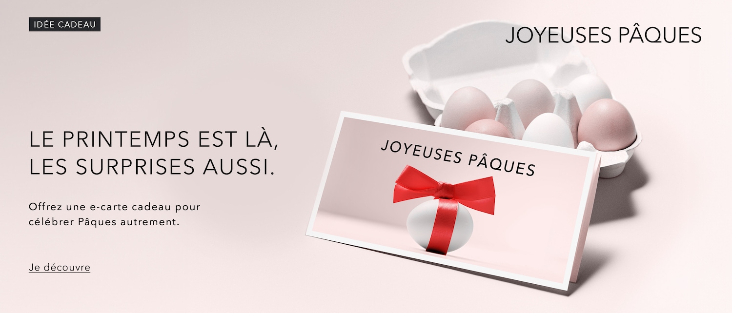 Célébrez Pâques avec une carte-cadeau : l'image représente une boîte d'œufs et un œuf décoré d'un ruban rouge, avec la mention « Joyeuses Pâques », qui vous invite à en découvrir davantage.