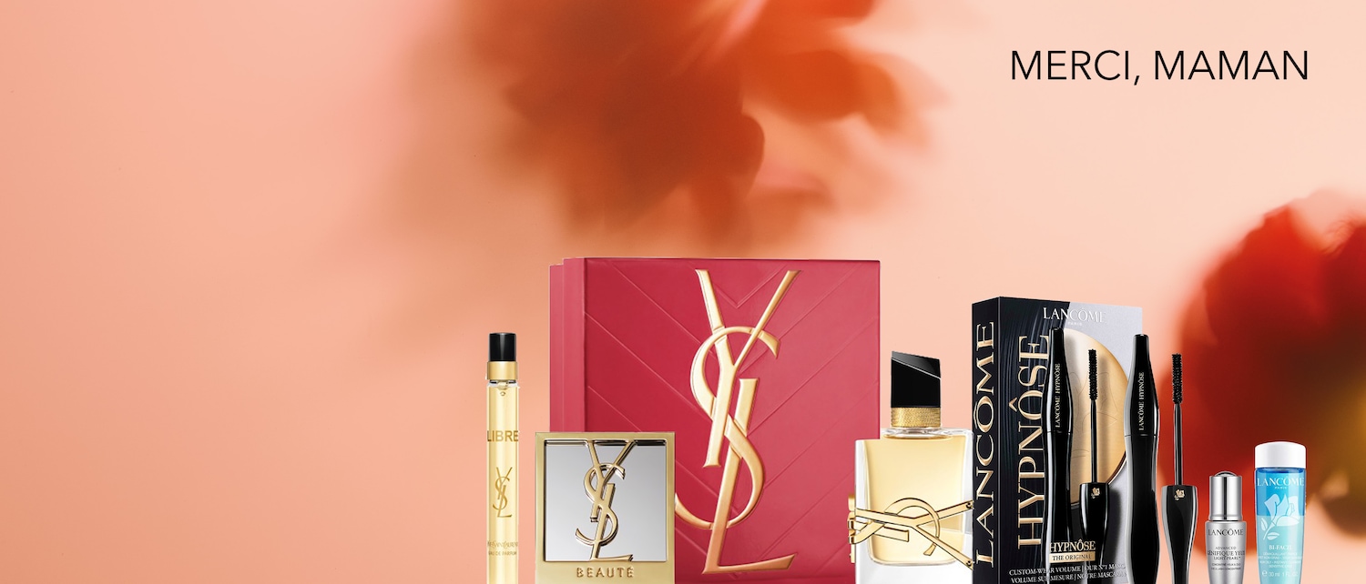 Découvrez une sélection de produits de beauté, incluant des parfums Yves Saint Laurent et des mascaras Lancôme, présentés avec le message « MERCI, MAMAN ».