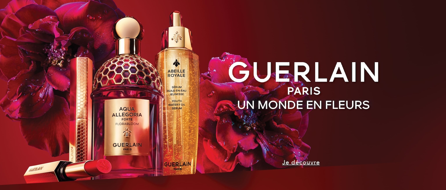 Découvrez le monde en fleurs de Guerlain avec Aqua Allegoria Forte Florabloom, le sérum Abeille Royale et le rouge à lèvres Rouge G, présentés sur un fond rouge foncé orné de roses rouges.