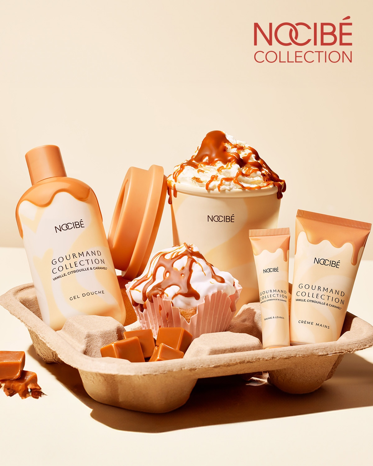 Découvrez la collection Gourmand de Nocibé, une gamme de produits pour le corps et les lèvres aux senteurs vanille, citrouille et caramel, présentée dans un emballage rappelant des douceurs sucrées.