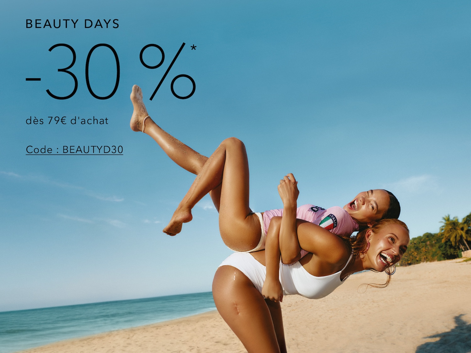 Profitez des Beauty Days avec 30% de réduction dès 79€ d'achat en utilisant le code BEAUTYD30, illustré par deux femmes joyeuses sur une plage ensoleillée.